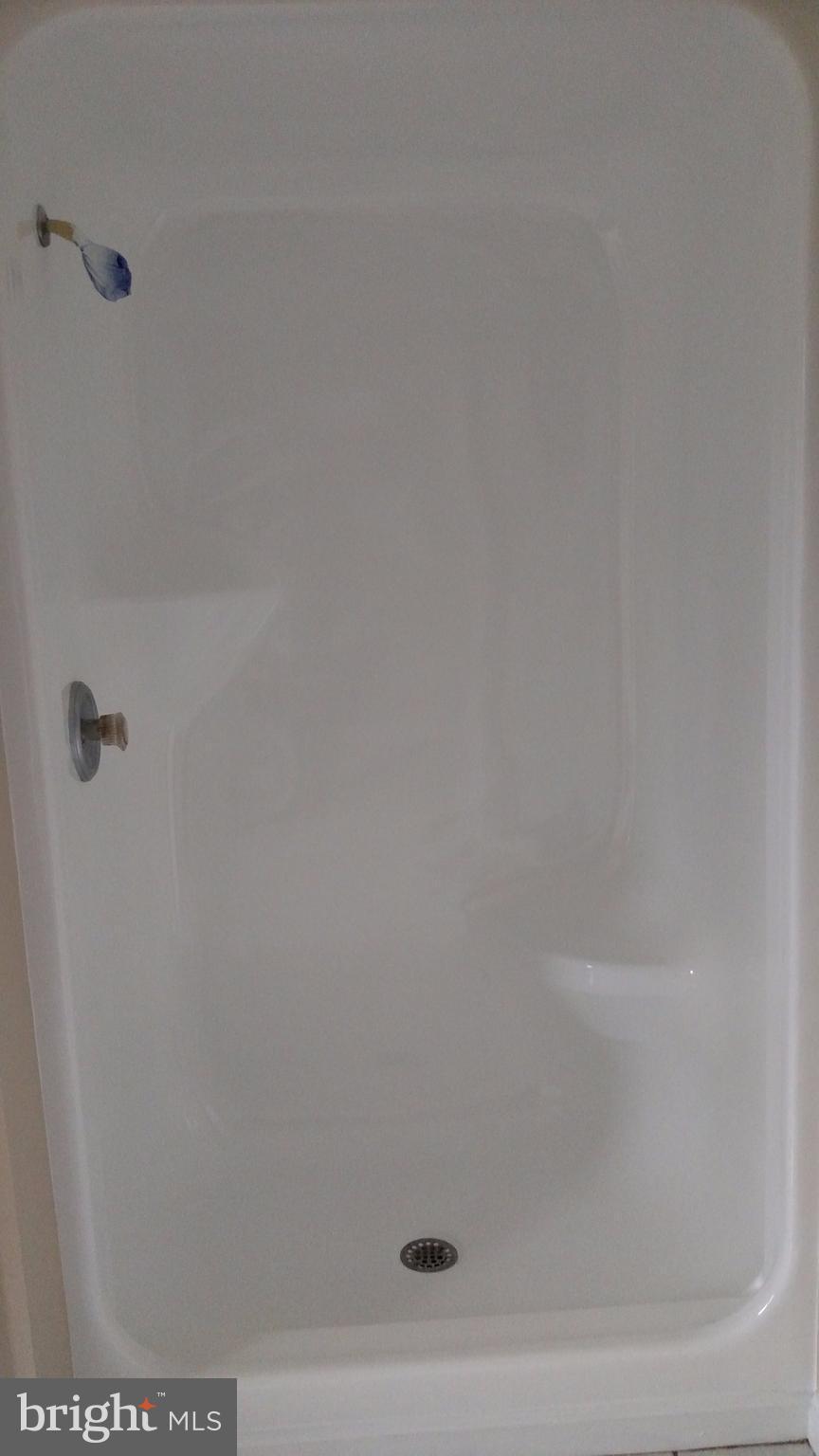 93 Griffith Way Owings, MD 20736 - Photo 14 of 22 a close up of a bathtub