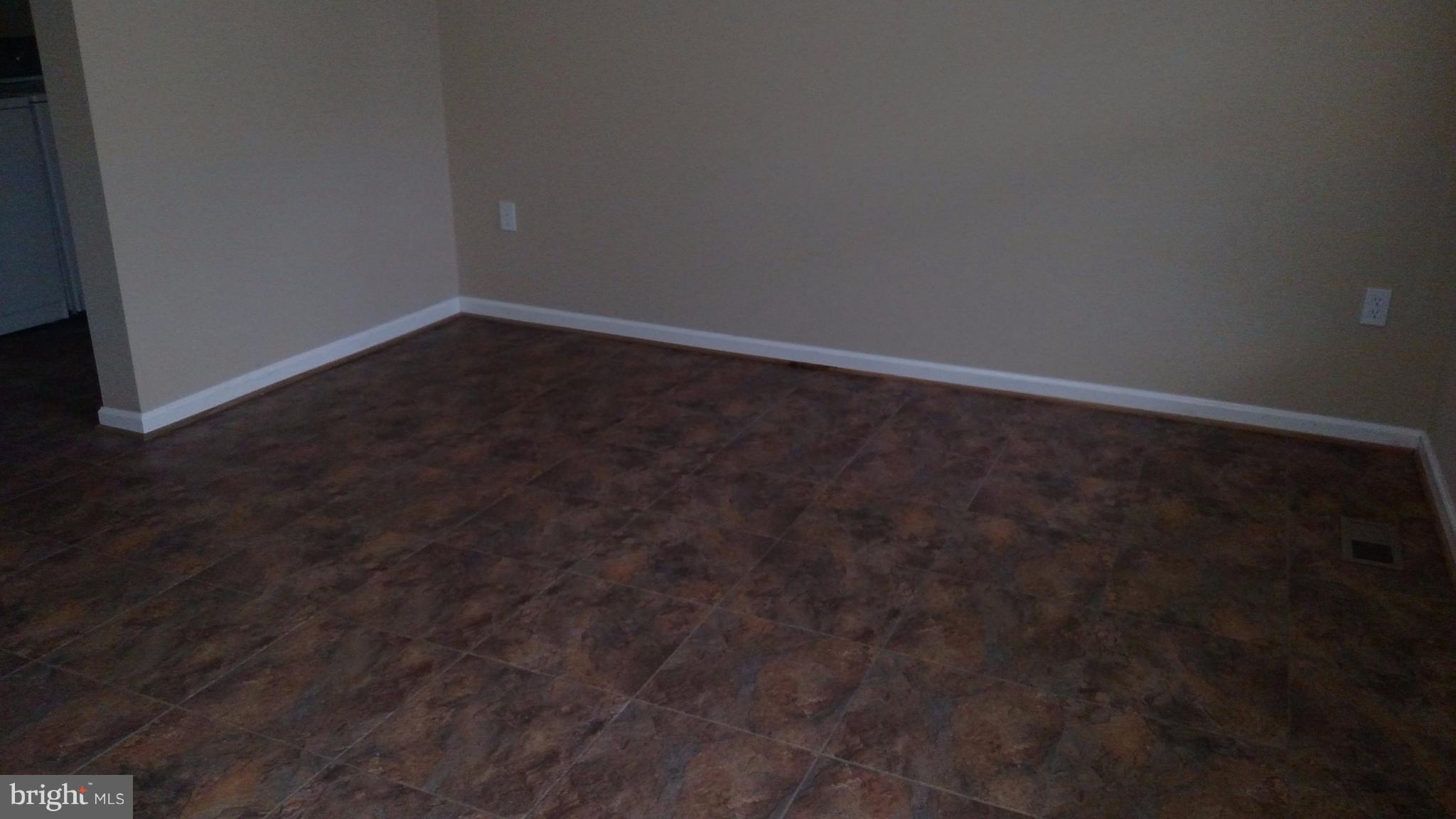 93 Griffith Way Owings, MD 20736 - Photo 4 of 22 a view of an empty room