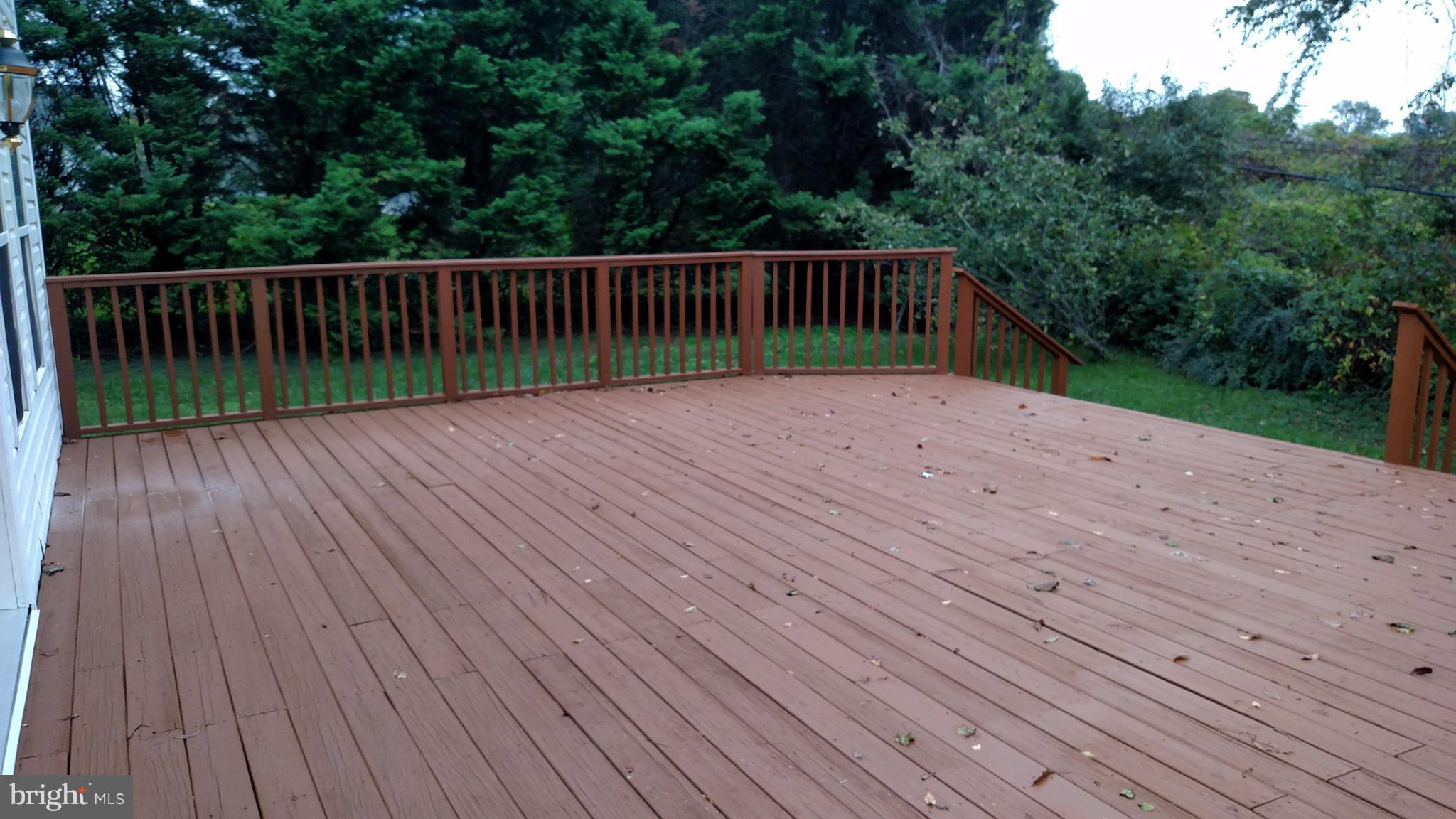 93 Griffith Way Owings, MD 20736 - Photo 8 of 22 a view of backyard with wooden floor