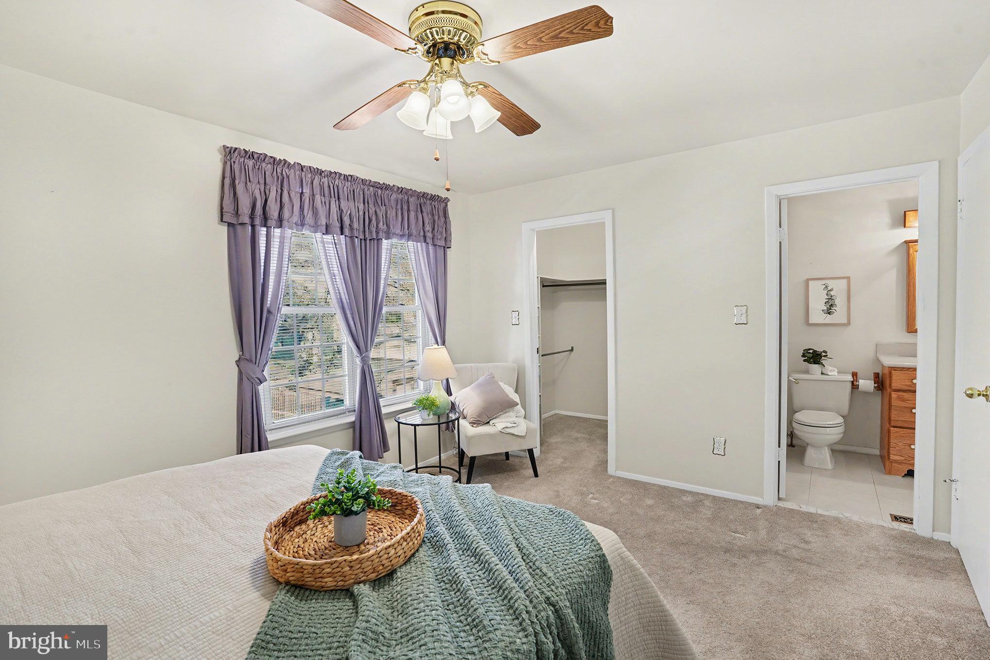 7114 Oliver Beach Road Baltimore, MD 21220 - Photo 20 of 49 a living room with furniture and a table
