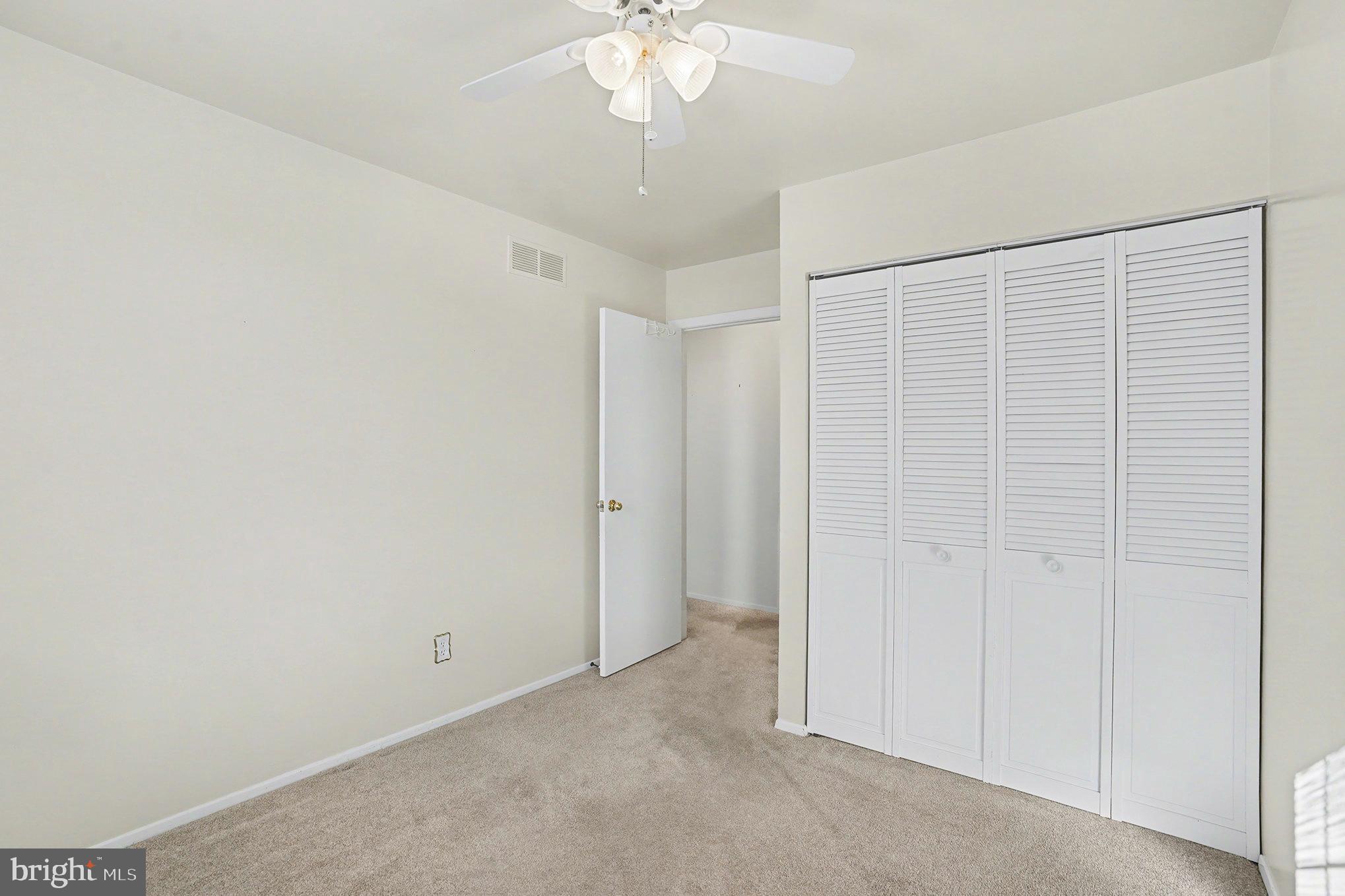 7114 Oliver Beach Road Baltimore, MD 21220 - Photo 24 of 49 a view of a chandelier in big room and chandelier fan