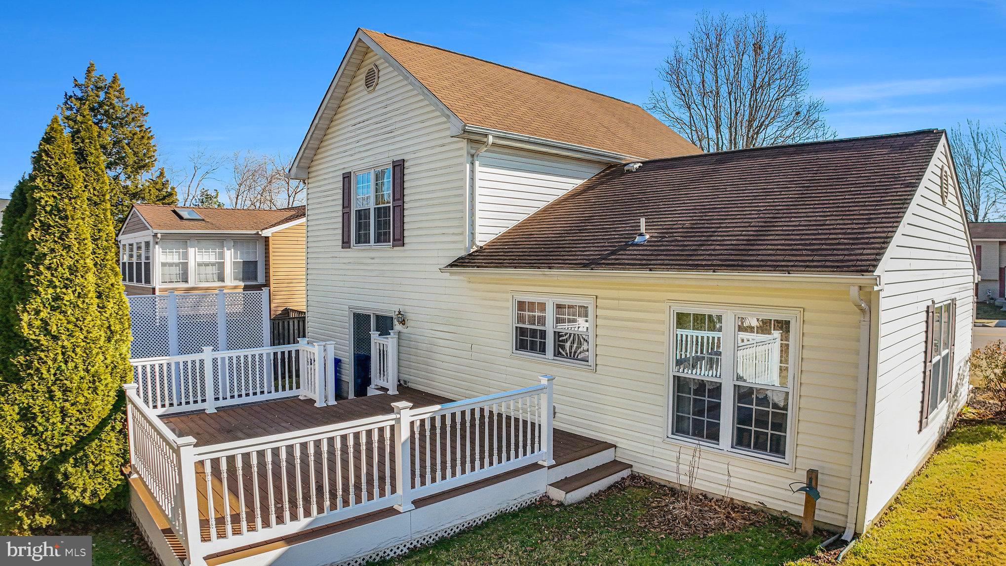 7114 Oliver Beach Road Baltimore, MD 21220 - Photo 29 of 49 a front view of a house with a garden