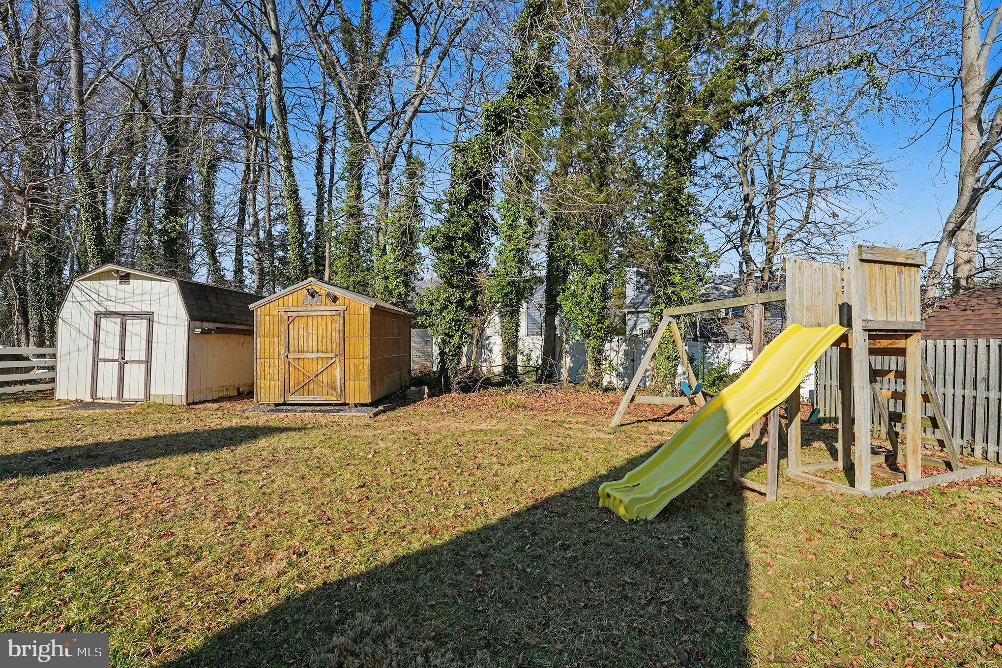 7114 Oliver Beach Road Baltimore, MD 21220 - Photo 31 of 49 a view of a slide with a bench