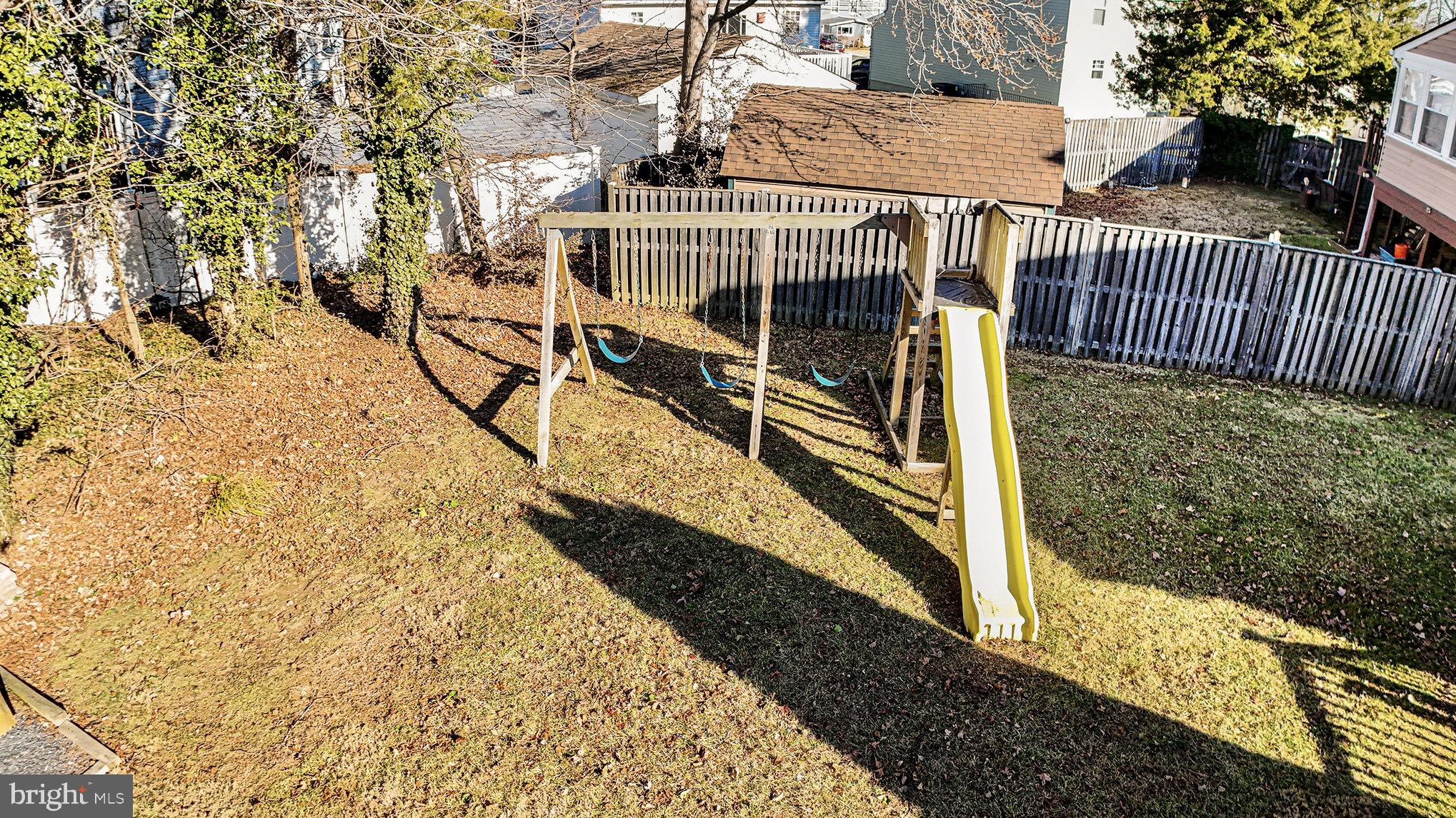 7114 Oliver Beach Road Baltimore, MD 21220 - Photo 34 of 49 a view of a pathway with a yard