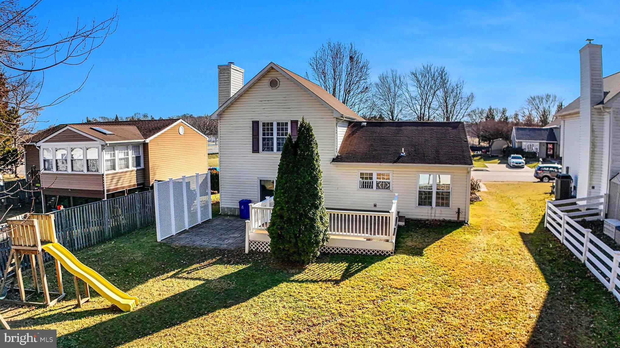 7114 Oliver Beach Road Baltimore, MD 21220 - Photo 35 of 49 a view of a house with swimming pool next to a yard