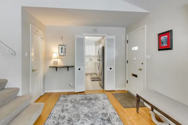 a spacious bedroom with a bed and a couch