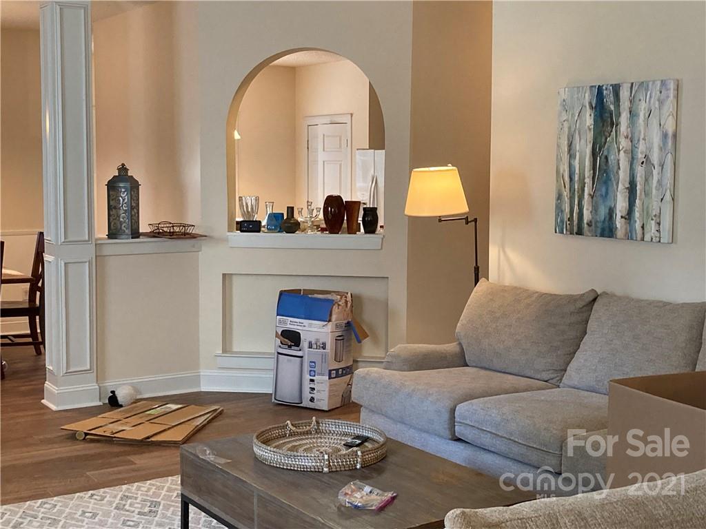 13824 Hastings Farm Road Huntersville, NC 28078 - Photo 5 of 14 a living room with furniture and a fireplace