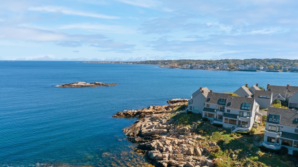 13 Rowe Point, Unit 13 Rockport, MA 01966 - Photo 23 of 27 an aerial view of a house with lots of trees sitting space and garden