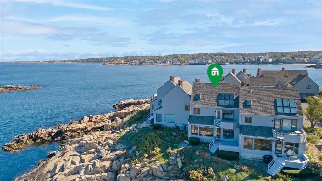 13 Rowe Point, Unit 13 Rockport, MA 01966 - Photo 26 of 27 a view of a city and ocean view