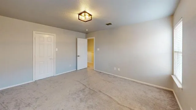 an empty room with a window