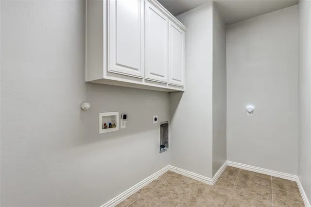 a view of storage and utility room with empty racks