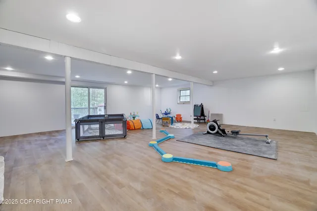 a view of a yard with large trees