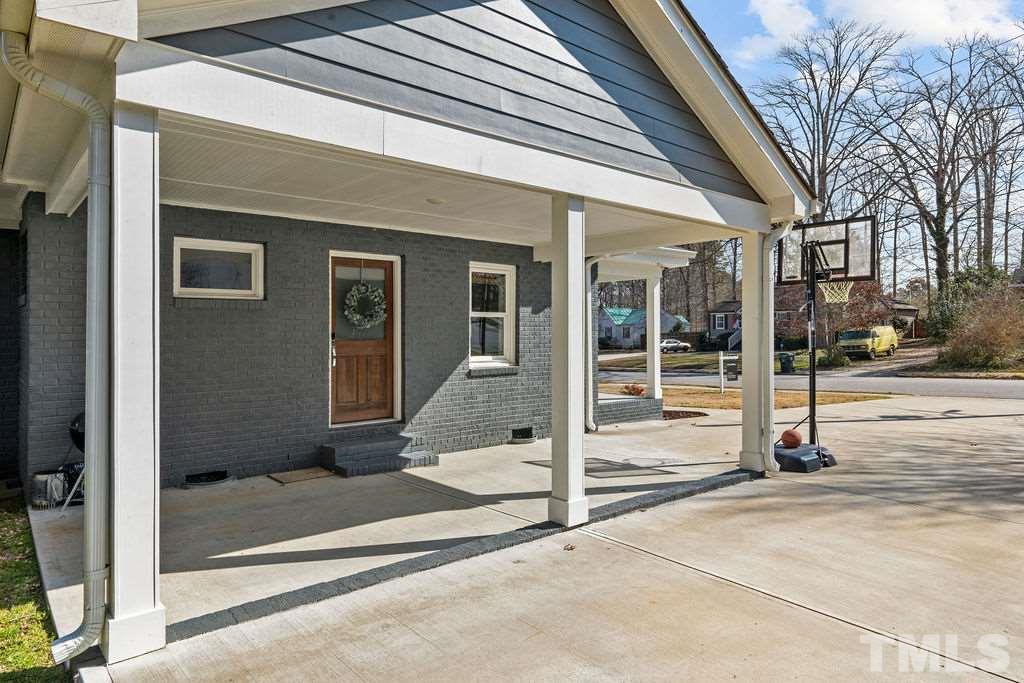 417 North King Charles Road Raleigh, NC 27610 - Photo 22 of 30 a view of a entrance door of the house