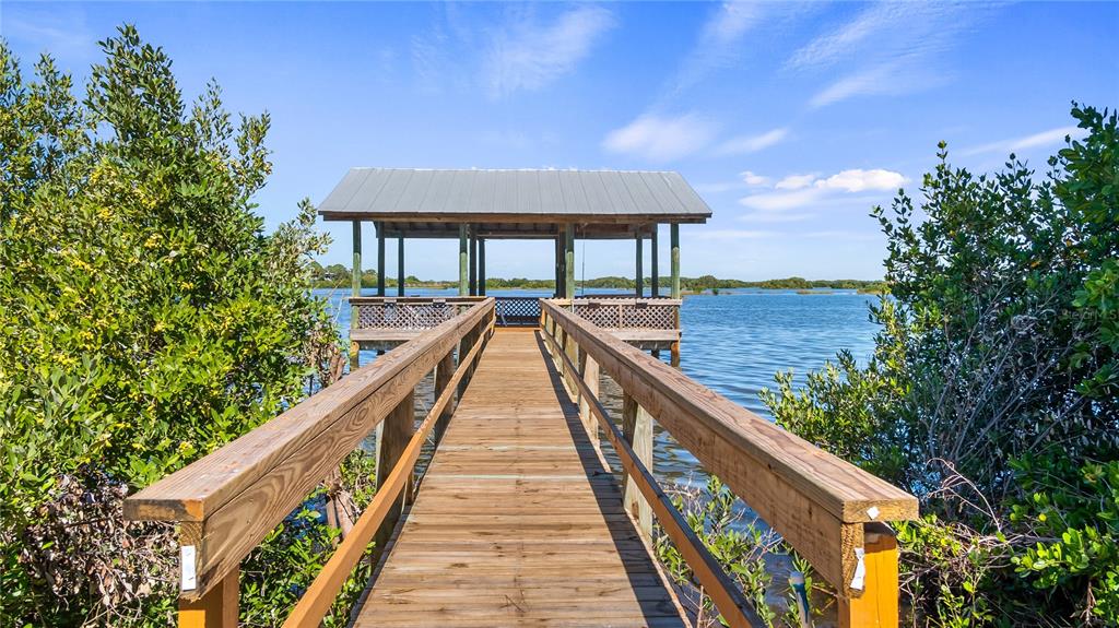 16317 Andrews Circle Cedar Key, FL 32625 - Photo 23 of 53 a view of balcony with wooden floor and fence