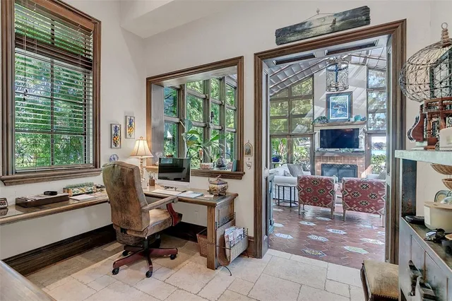 a view of walk in closet with clothes