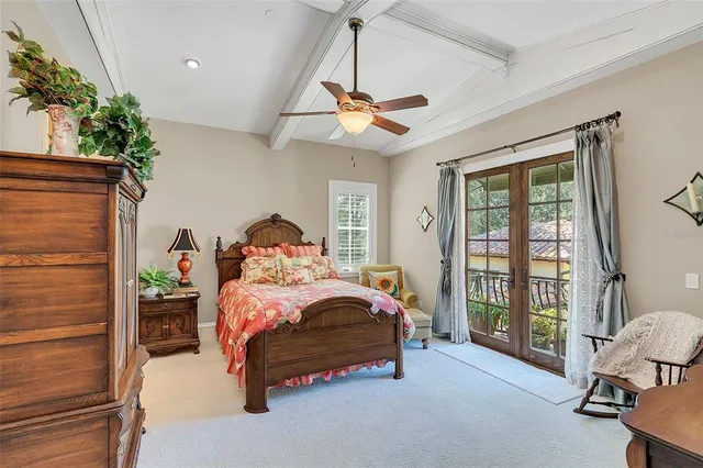 a view of livingroom with fireplace and chandelier