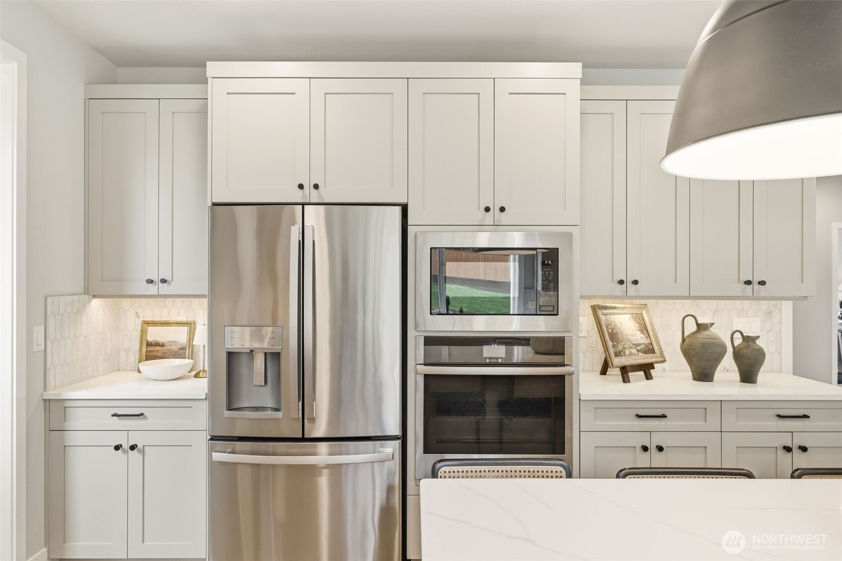 2944 215th Place Southwest Brier, WA 98036 - Photo 13 of 40 a kitchen with appliances a refrigerator and cabinets