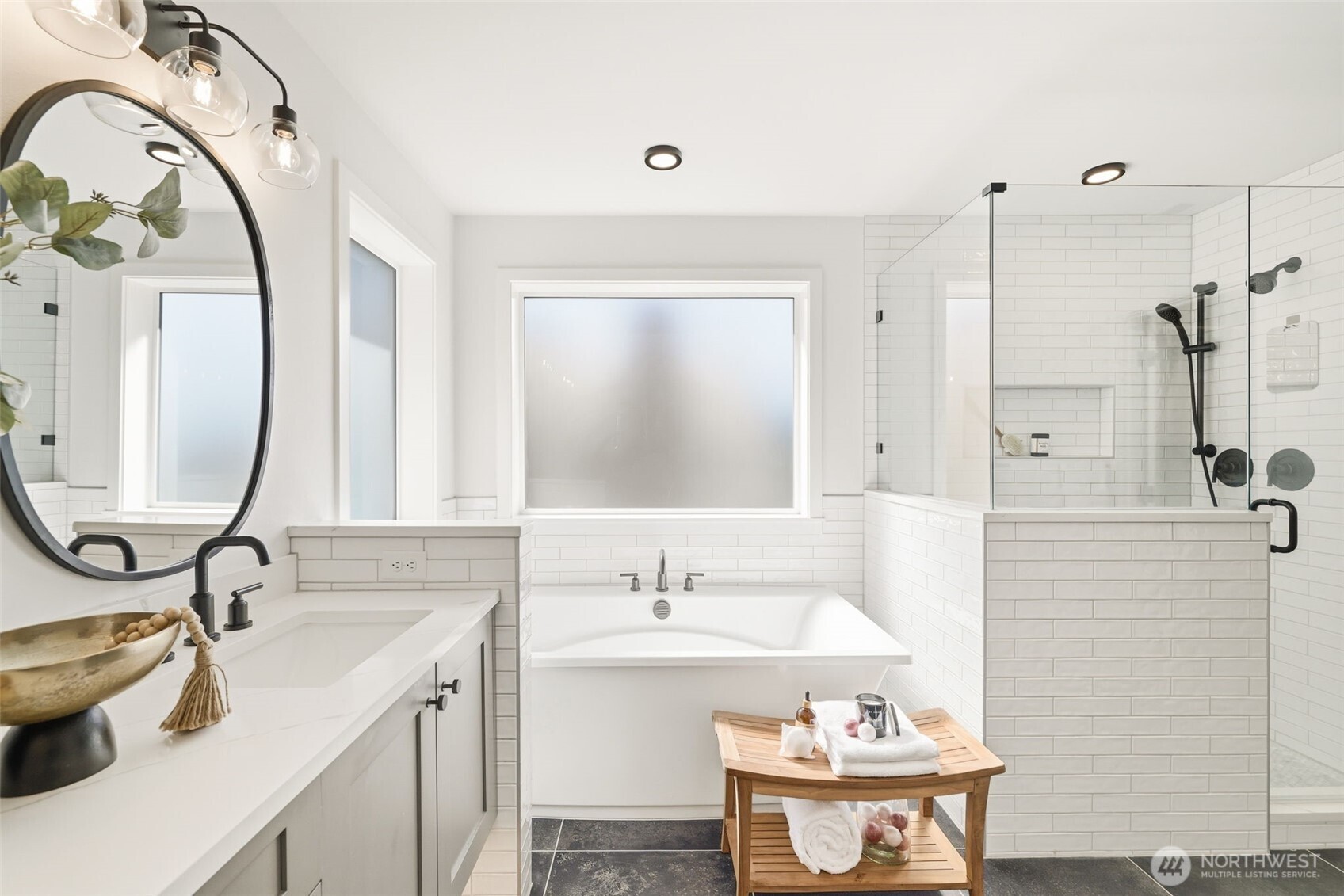 2944 215th Place Southwest Brier, WA 98036 - Photo 19 of 40 a bathroom with a sink and a mirror