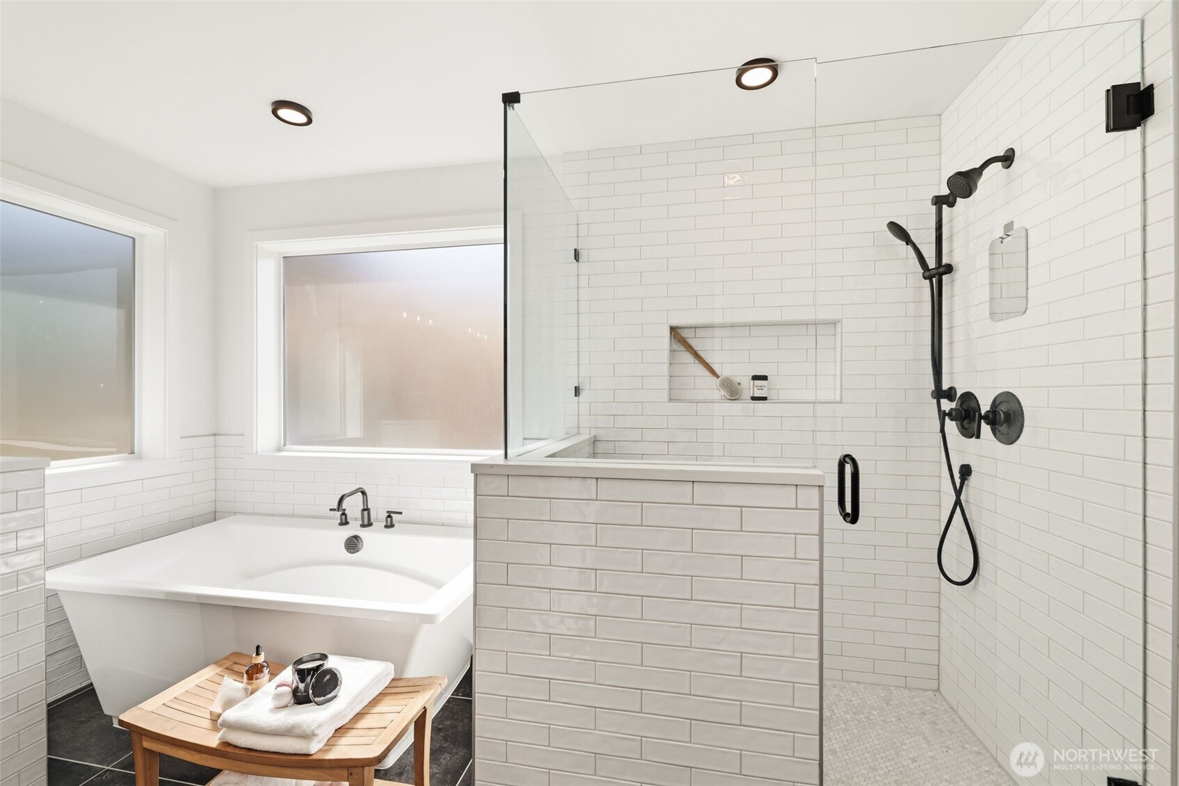 2944 215th Place Southwest Brier, WA 98036 - Photo 20 of 40 a bathroom with a tub a sink and a shower
