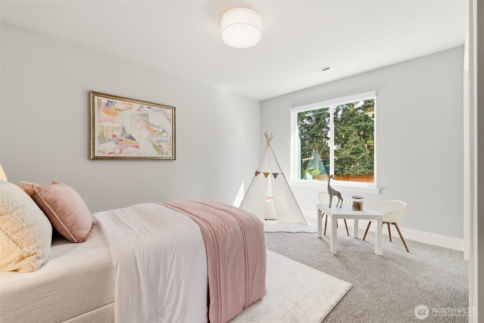 2944 215th Place Southwest Brier, WA 98036 - Photo 24 of 40 a bed room with a bed and a chair