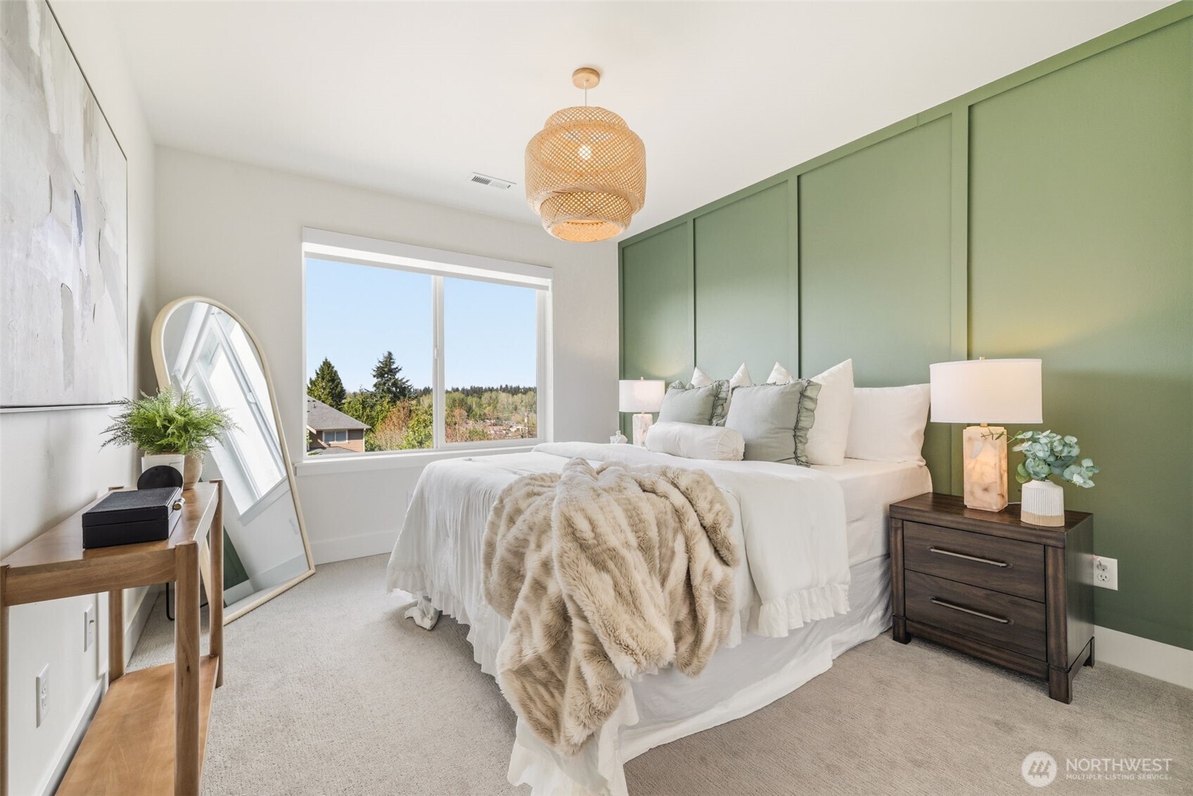 2944 215th Place Southwest Brier, WA 98036 - Photo 26 of 40 a bedroom with a bed and a chandelier