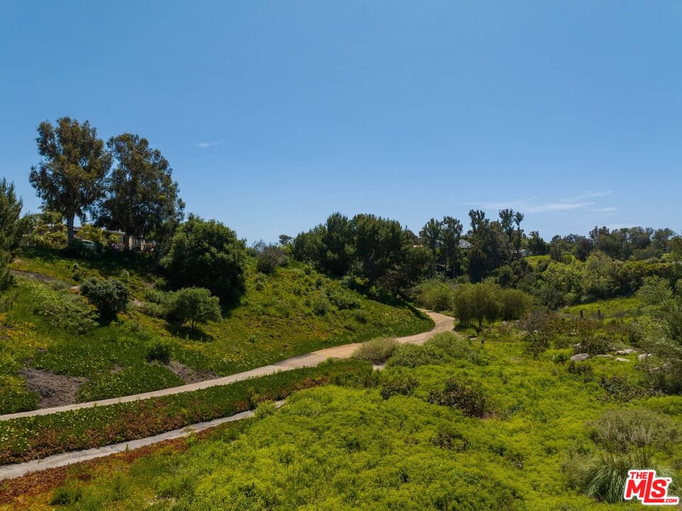 249 Paradise Cove Road Malibu, CA 90265 - Photo 35 of 41 a view of a field with trees in the background