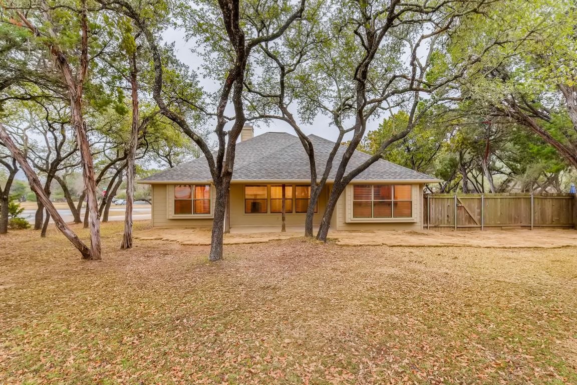 300 Venture Boulevard South Point Venture, TX 78645 - Photo 13 of 14 a tree in front of a white house