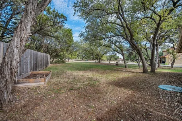 a view of backyard with green space
