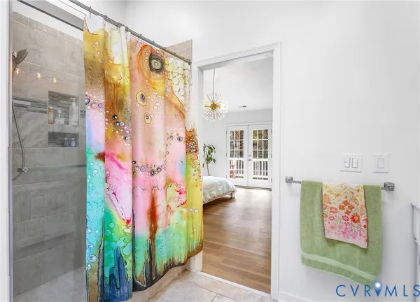 a view of backyard with outdoor seating and trees