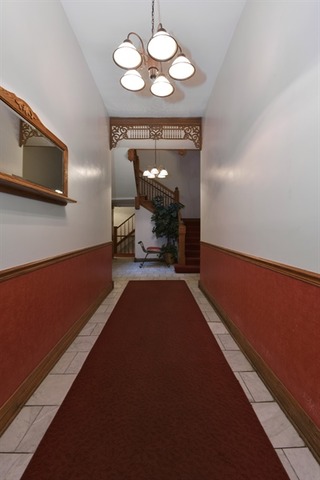 549 West Belden Avenue, Unit 2FE Chicago, IL 60614 - Photo 2 of 10 a view of a room with furniture and a chandelier