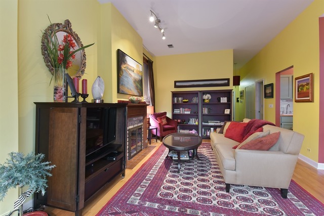 549 West Belden Avenue, Unit 2FE Chicago, IL 60614 - Photo 3 of 10 a living room with furniture and a fireplace