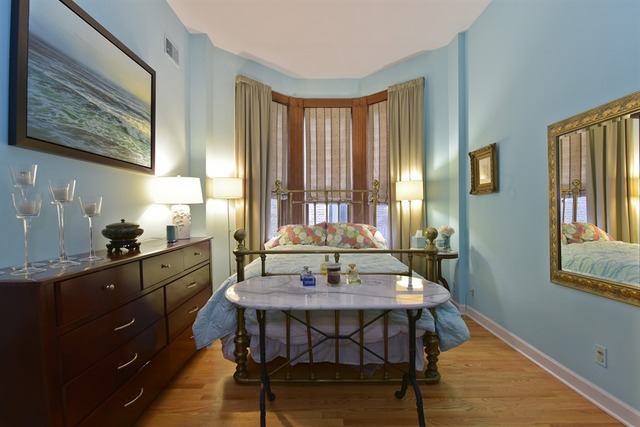 549 West Belden Avenue, Unit 2FE Chicago, IL 60614 - Photo 7 of 10 a view of a dining room with furniture and window
