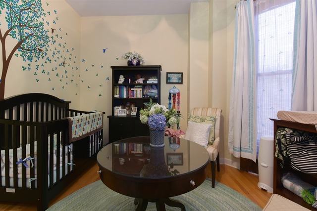 549 West Belden Avenue, Unit 2FE Chicago, IL 60614 - Photo 9 of 10 a dining room with furniture and wooden floor