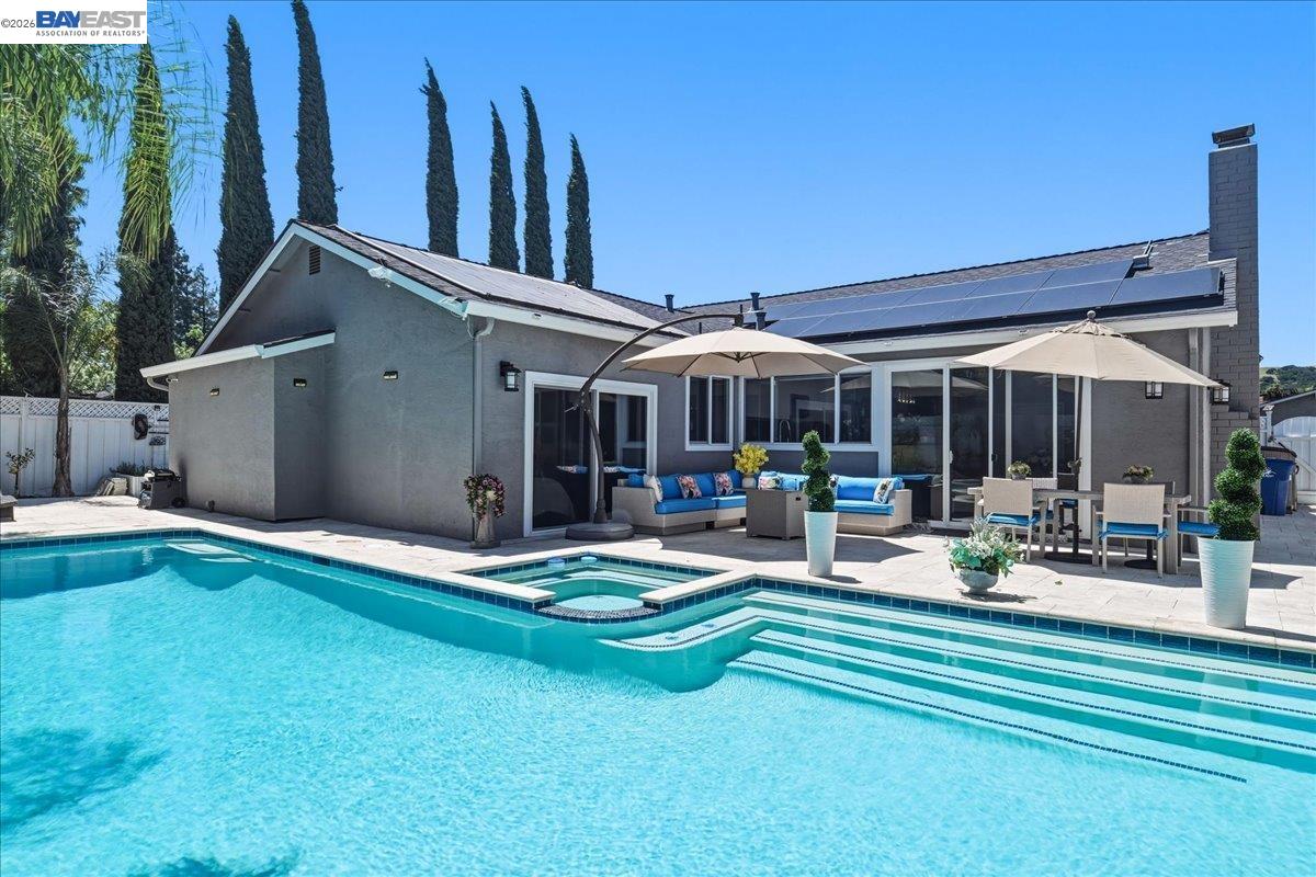2861 Millbridge Place San Ramon, CA 94583 - Photo 43 of 58 a view of a house with pool and sitting area