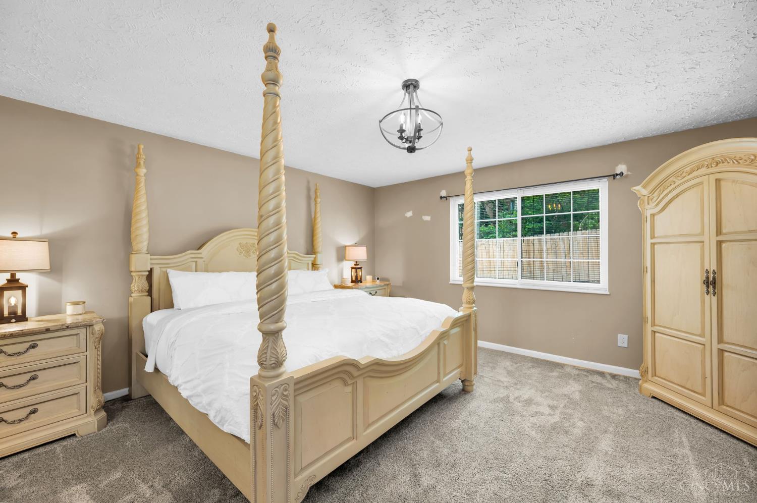 3543 Jessup Road, Unit 2B Cincinnati, OH 45239 - Photo 10 of 31 Spacious primary bedroom retreat with neutral finishes and natural light