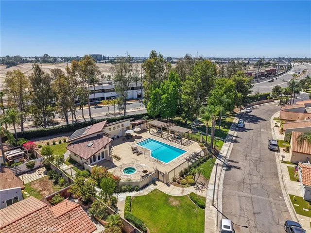 an aerial view of a house with a garden