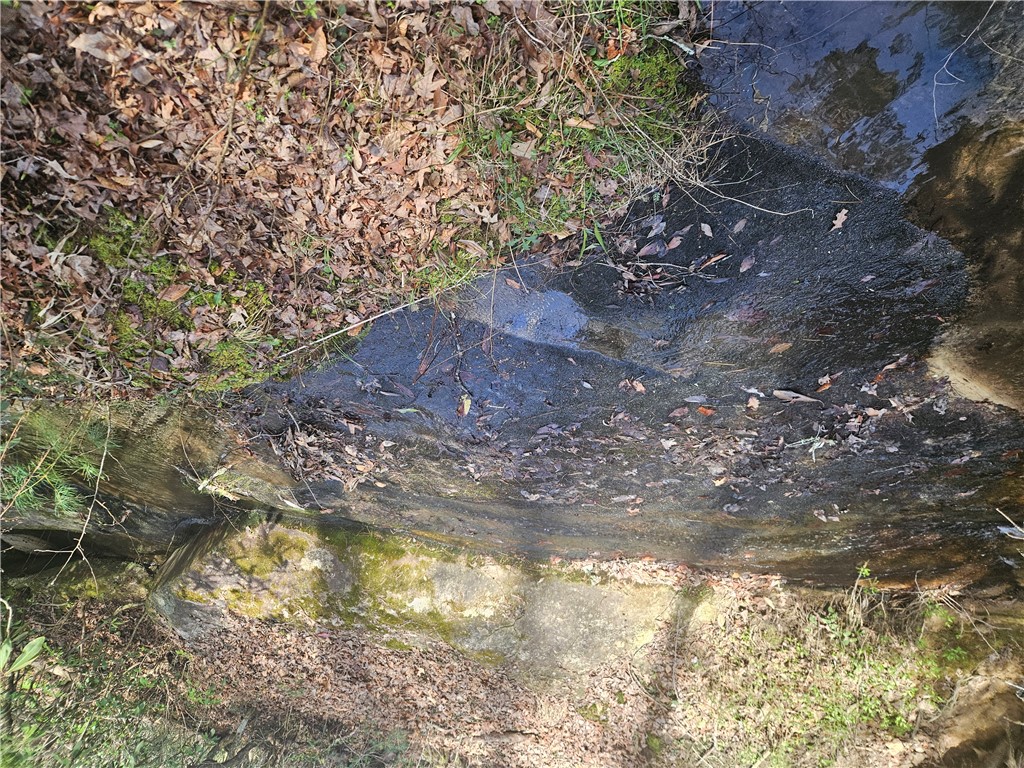 177 Cross Creek Road Salem, SC 29676 - Photo 6 of 7 Natural elements combine for a peaceful stream-side setting, offering serene views.