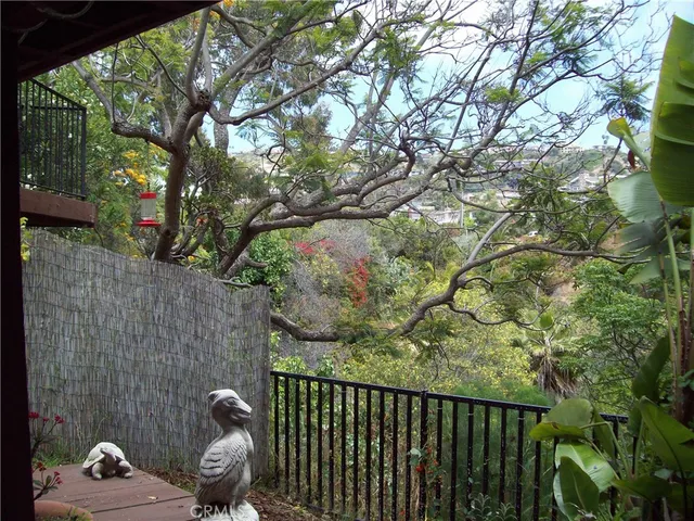 a kitchen with a stove and a sink