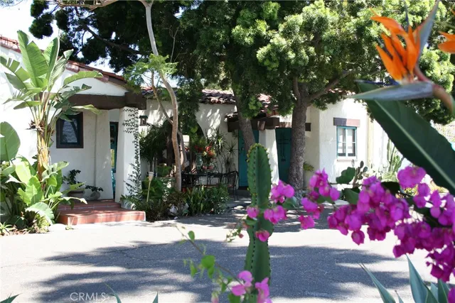 a kitchen with a refrigerator and cabinets