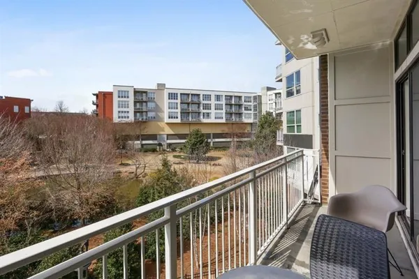 a view of balcony with furniture