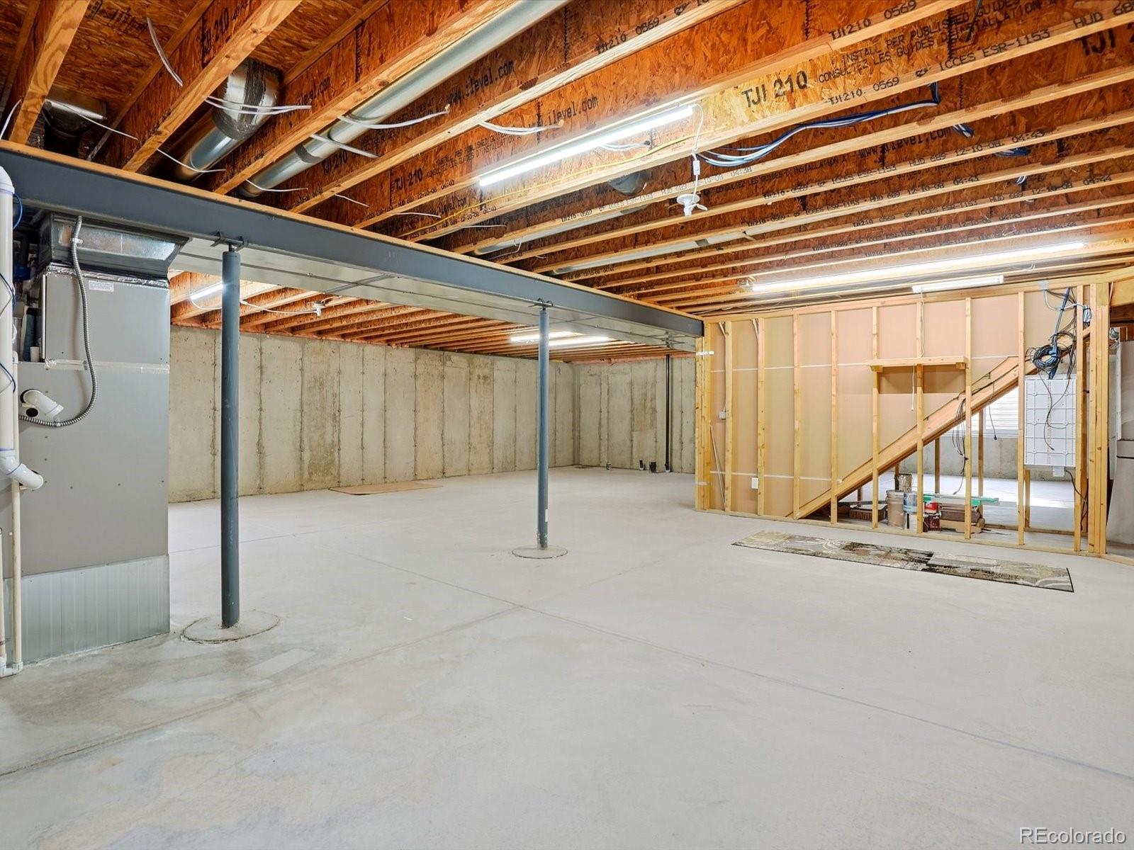 9720 Roadrunner Avenue Firestone, CO 80504 - Photo 27 of 46 a view of an indoor garage