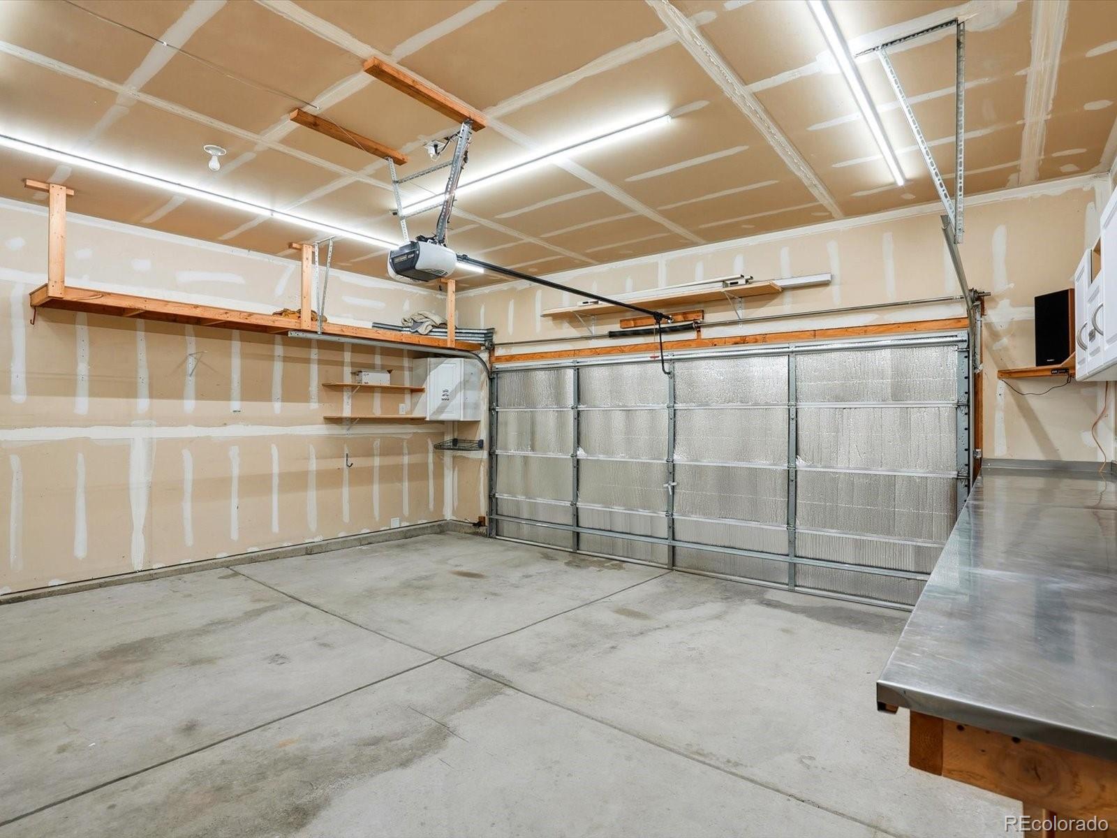 9720 Roadrunner Avenue Firestone, CO 80504 - Photo 35 of 46 a view of a garage