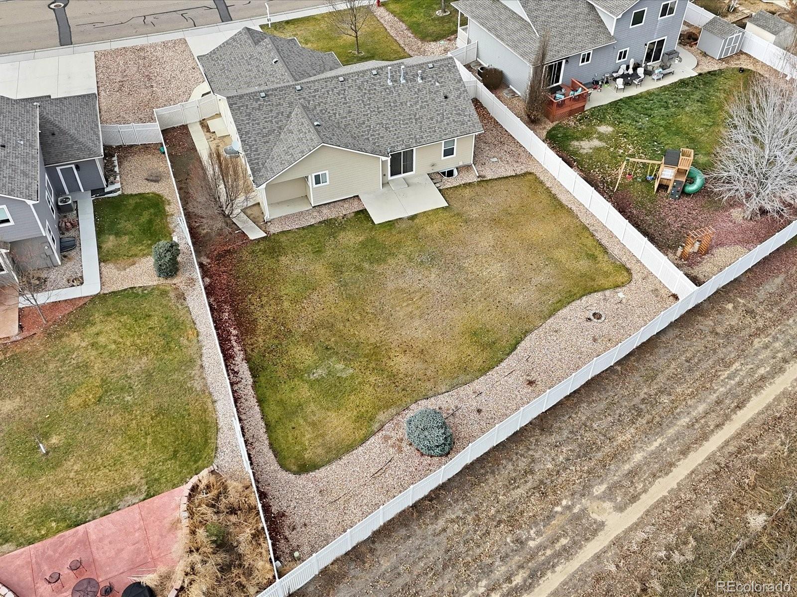 9720 Roadrunner Avenue Firestone, CO 80504 - Photo 37 of 46 an aerial view of residential houses with outdoor space