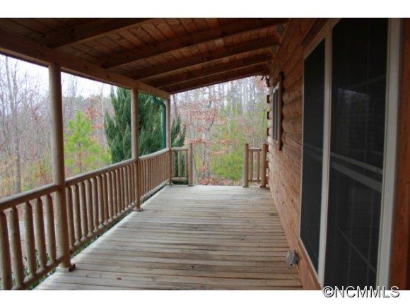 60 Rock Ridge Dr Mill Spring Mill Spring, NC 28756 - Photo 12 of 12 a view of backyard with wooden floor and outdoor seating