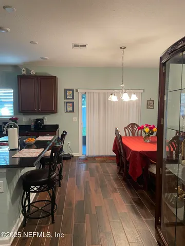 a view of a workspace with furniture