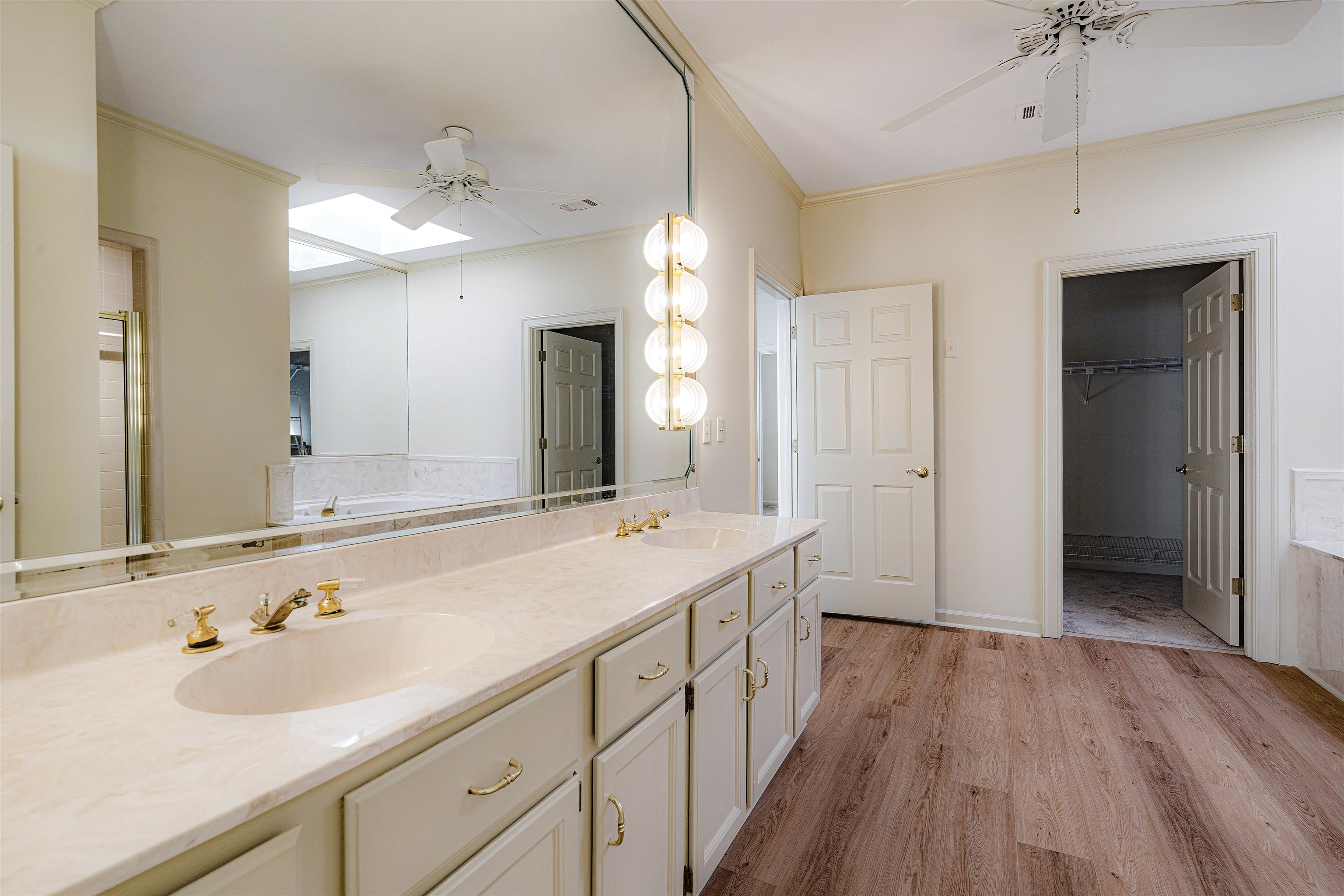 478 West Racquet Club Place Memphis, TN 38117 - Photo 22 of 39 a bathroom with a sink double vanity granite tub and shower