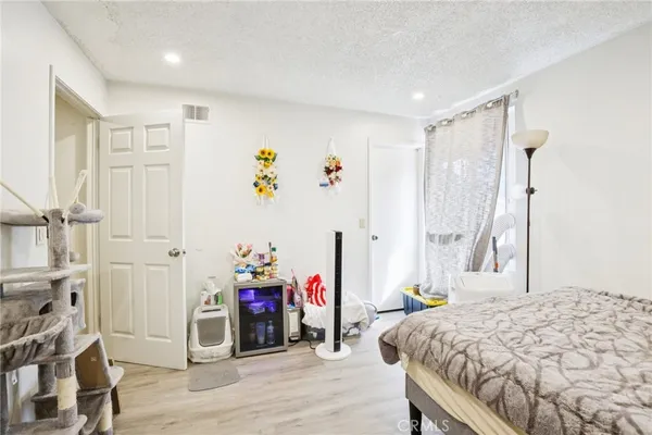a white kitchen with sink and white appliances