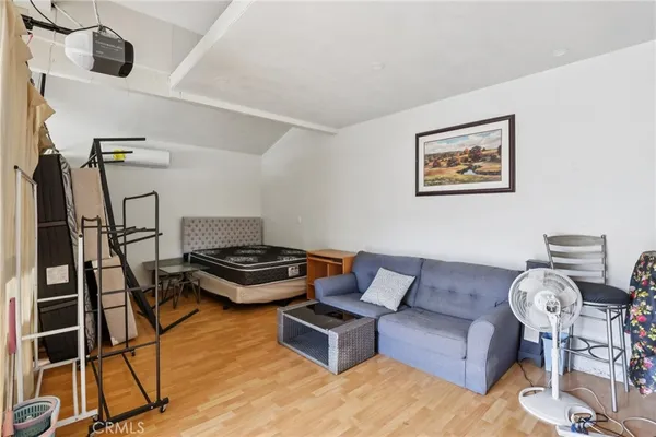 a view of a room with washer and dryer