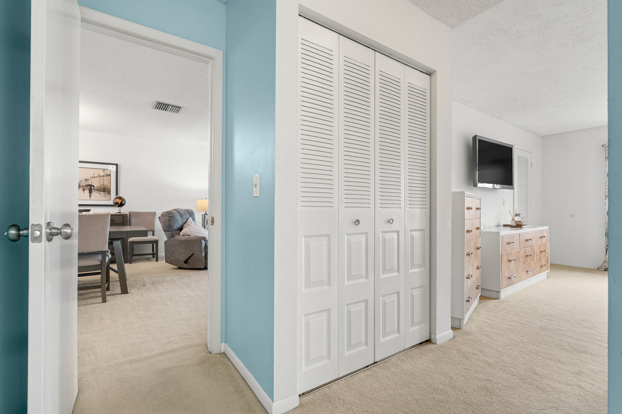 21218 Lago Circle, Unit F Boca Raton, FL 33433 - Photo 25 of 40 a living room with furniture and a flat screen tv