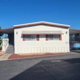a front view of a house with a garage